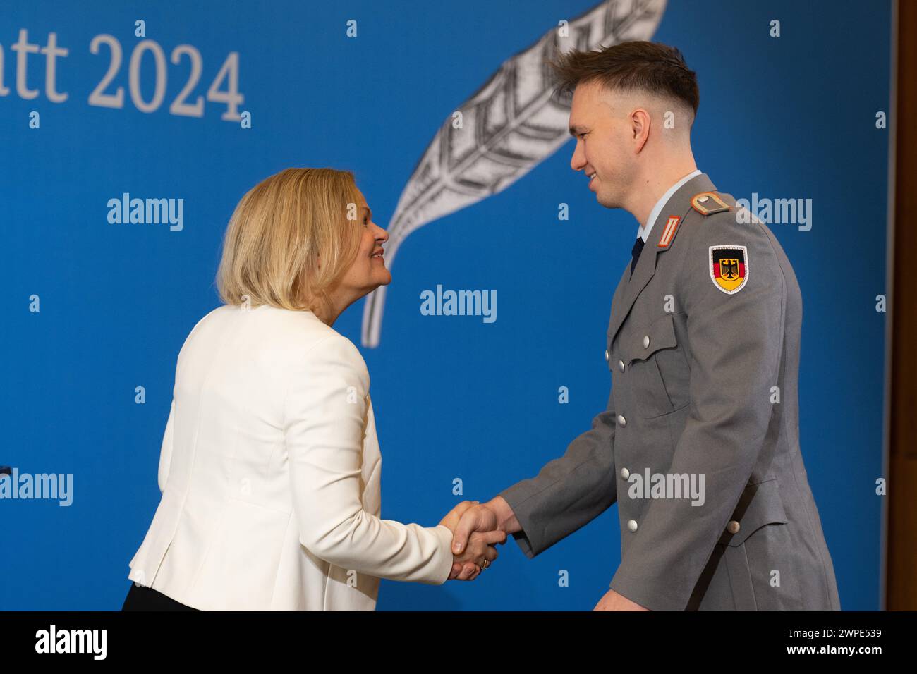 Berlin, Germany. 07th Mar, 2024. Nancy Faeser (SPD, l), Federal Minister of the Interior and Home Affairs, presents Niklas Kaul, decathlete, with the Silver Laurel Leaf. The Silver Laurel Leaf is Germany's highest state award for success in sport. Credit: Christophe Gateau/dpa/Alamy Live News Stock Photo