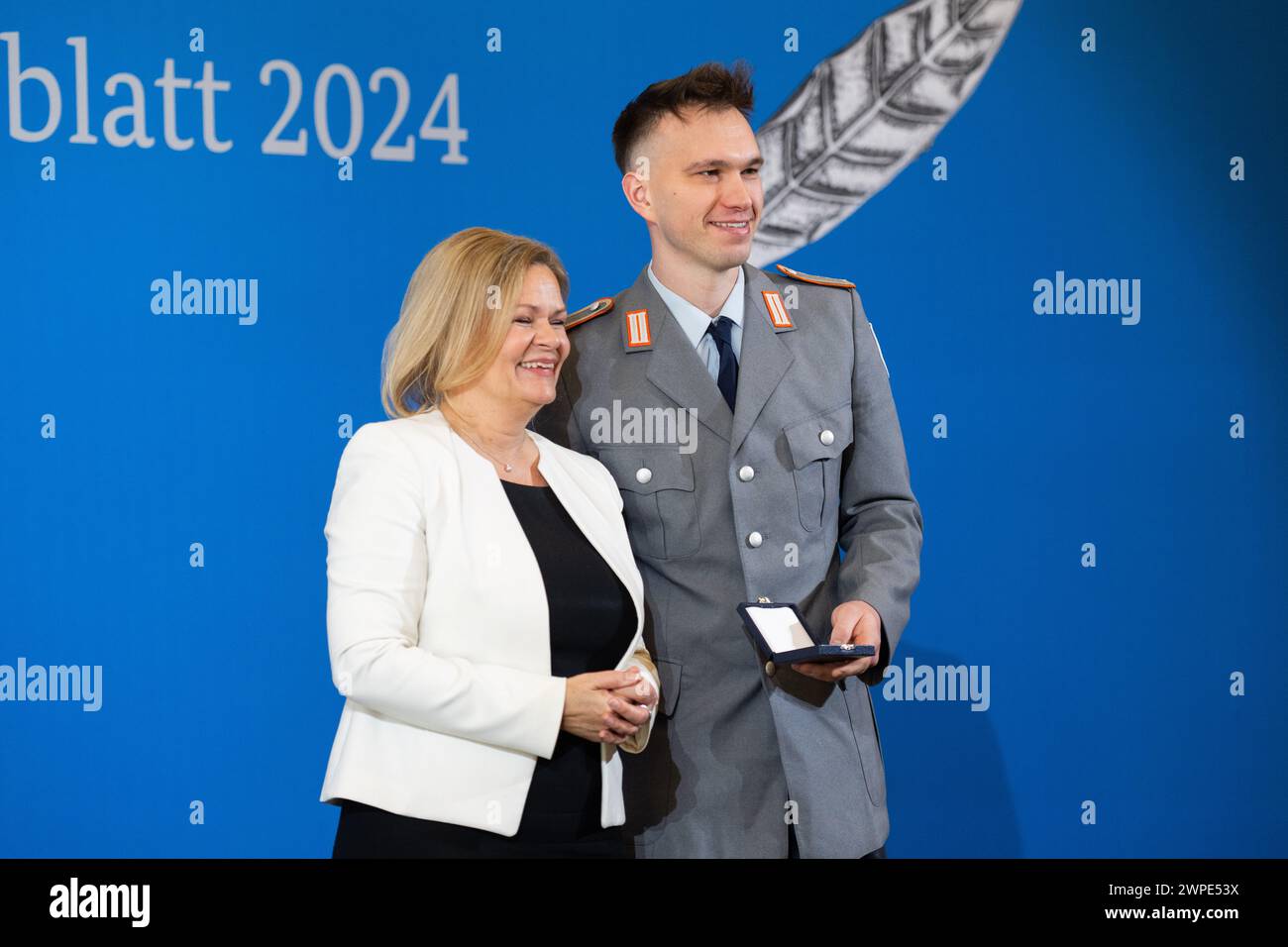 Berlin, Germany. 07th Mar, 2024. Nancy Faeser (SPD, l), Federal Minister of the Interior and Home Affairs, presents Niklas Kaul, decathlete, with the Silver Laurel Leaf. The Silver Laurel Leaf is Germany's highest state award for success in sport. Credit: Christophe Gateau/dpa/Alamy Live News Stock Photo