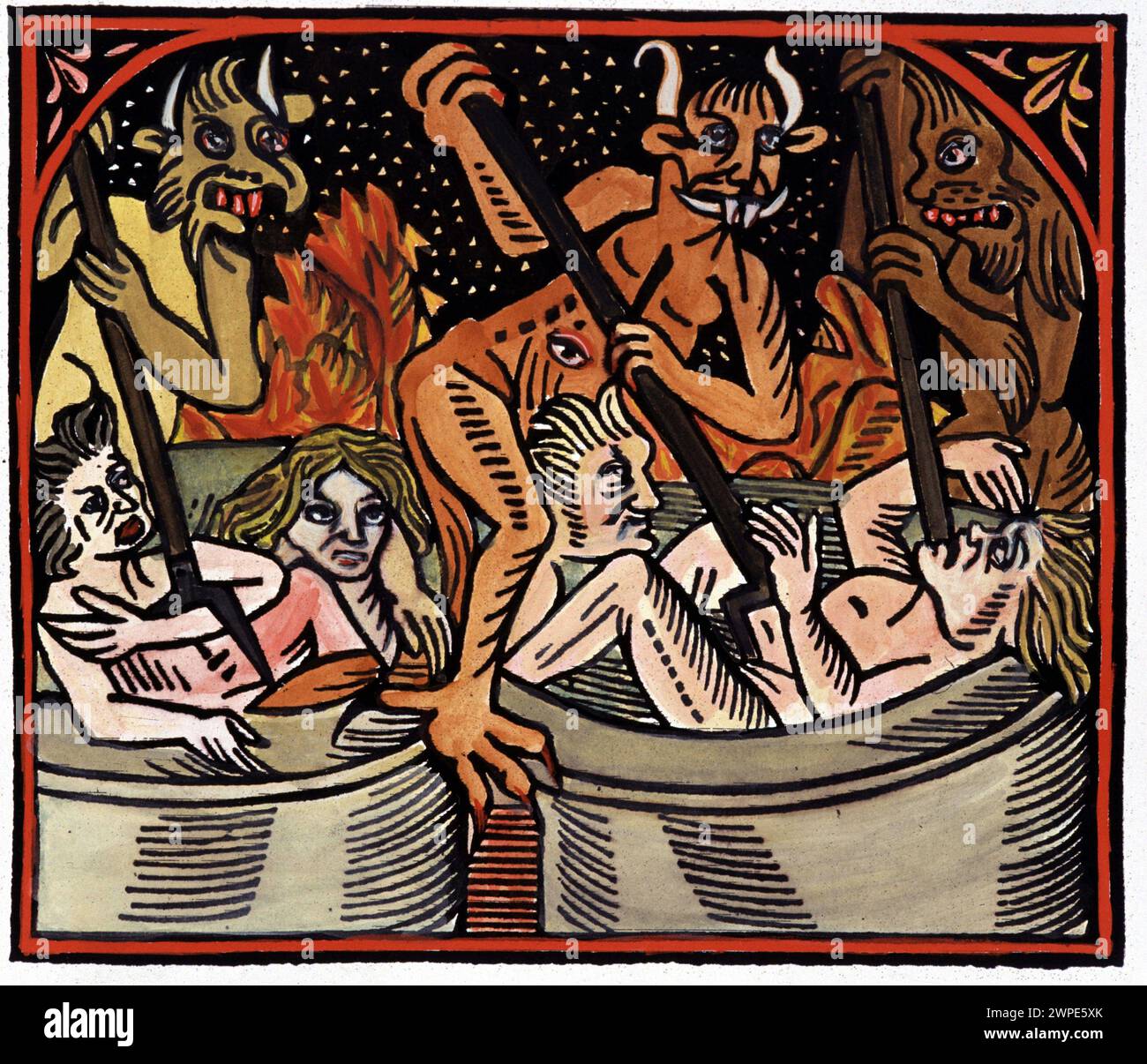 Devils cooking men in cauldrons in hell Stock Photo