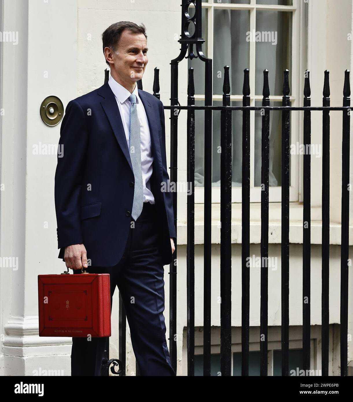 England, London, Westminster, Jeremy Hunt, Conservative Chancellor of the Exchequer, holding the red despatch box on Downing Street  during budget day 2024. Stock Photo