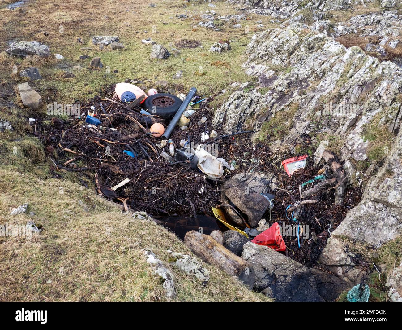 Plastic washed ashore at Saligo Bay on Islay, Scotland, UK. Stock Photo