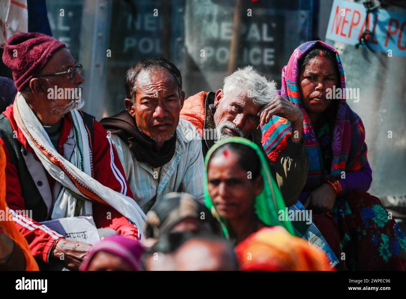 Kathmandu, Nepal. 07th Mar, 2024. Victims of loan sharking listen to people speak on stage demanding justice after 38 days of protest in Kathmandu. Despite government promises, they're still trapped in debt, facing high-interest rates and coercion. Credit: SOPA Images Limited/Alamy Live News Stock Photo