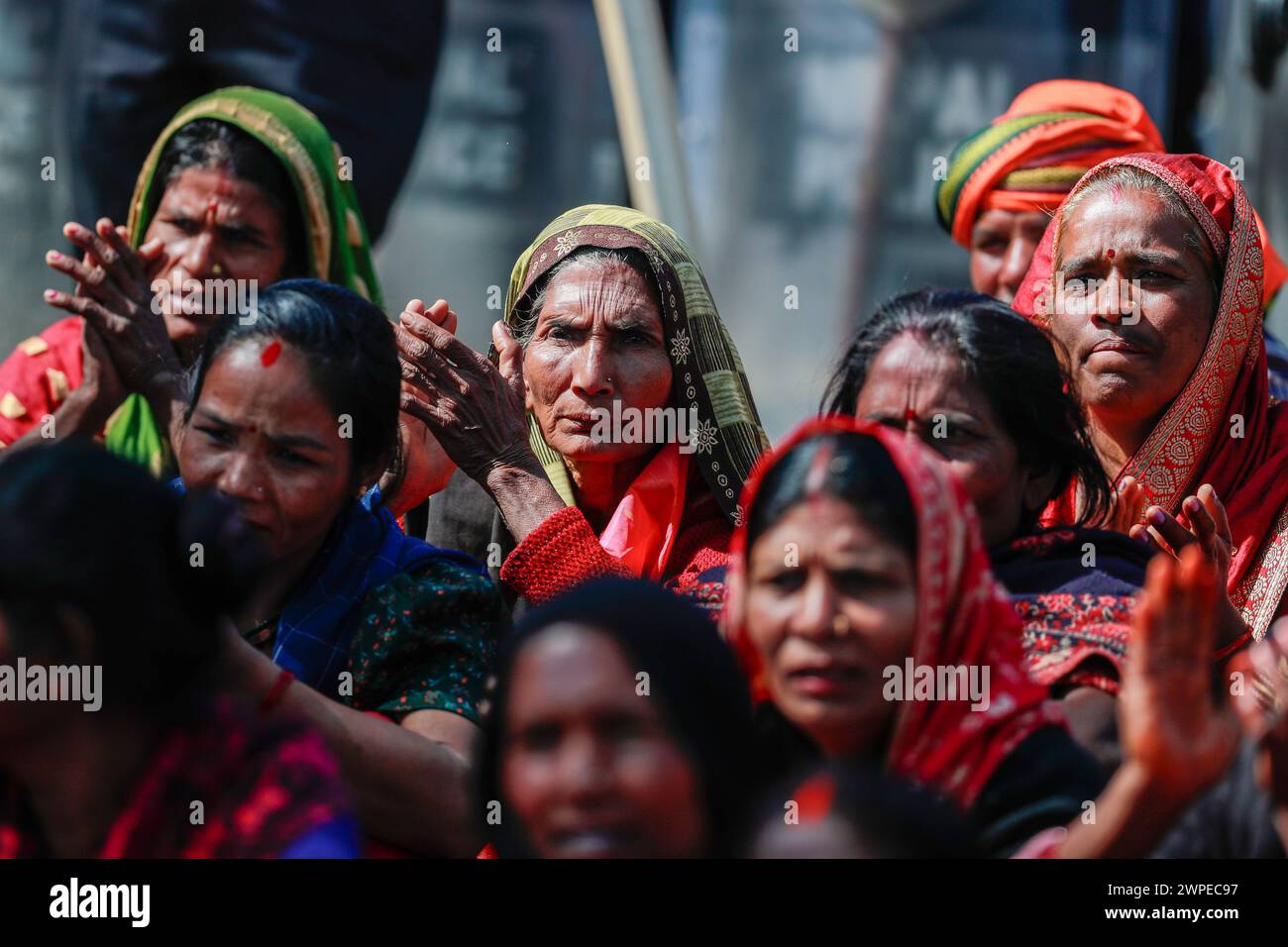 Kathmandu, Nepal. 07th Mar, 2024. Victims of loan sharking listen to people speak on stage demanding justice after 38 days of protest in Kathmandu. Despite government promises, they're still trapped in debt, facing high-interest rates and coercion. Credit: SOPA Images Limited/Alamy Live News Stock Photo