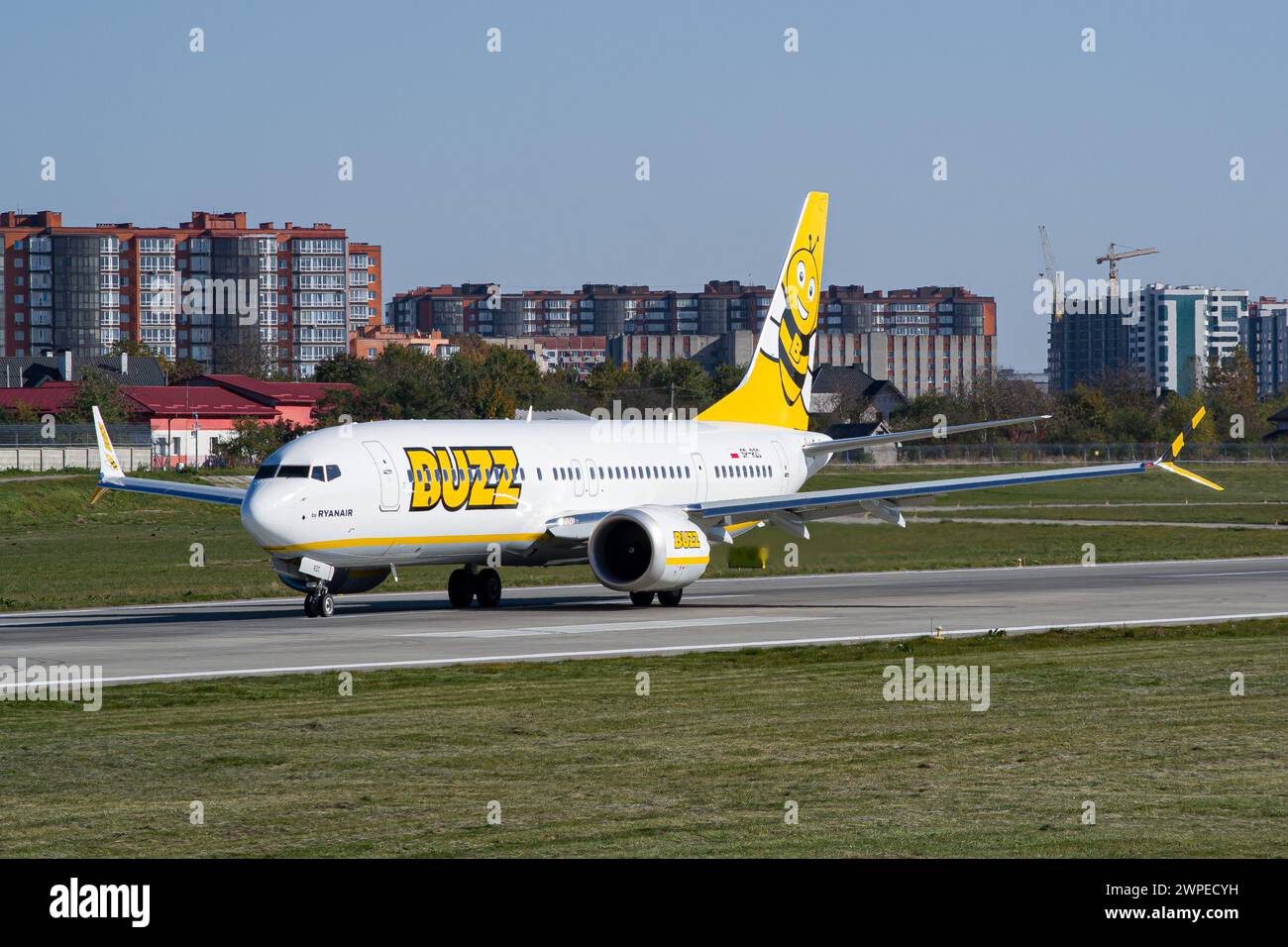 Buzz Airlines (operated by Ryanair) Boeing 737 MAX 8-200 taxiing after landing at Lviv Airport Stock Photo