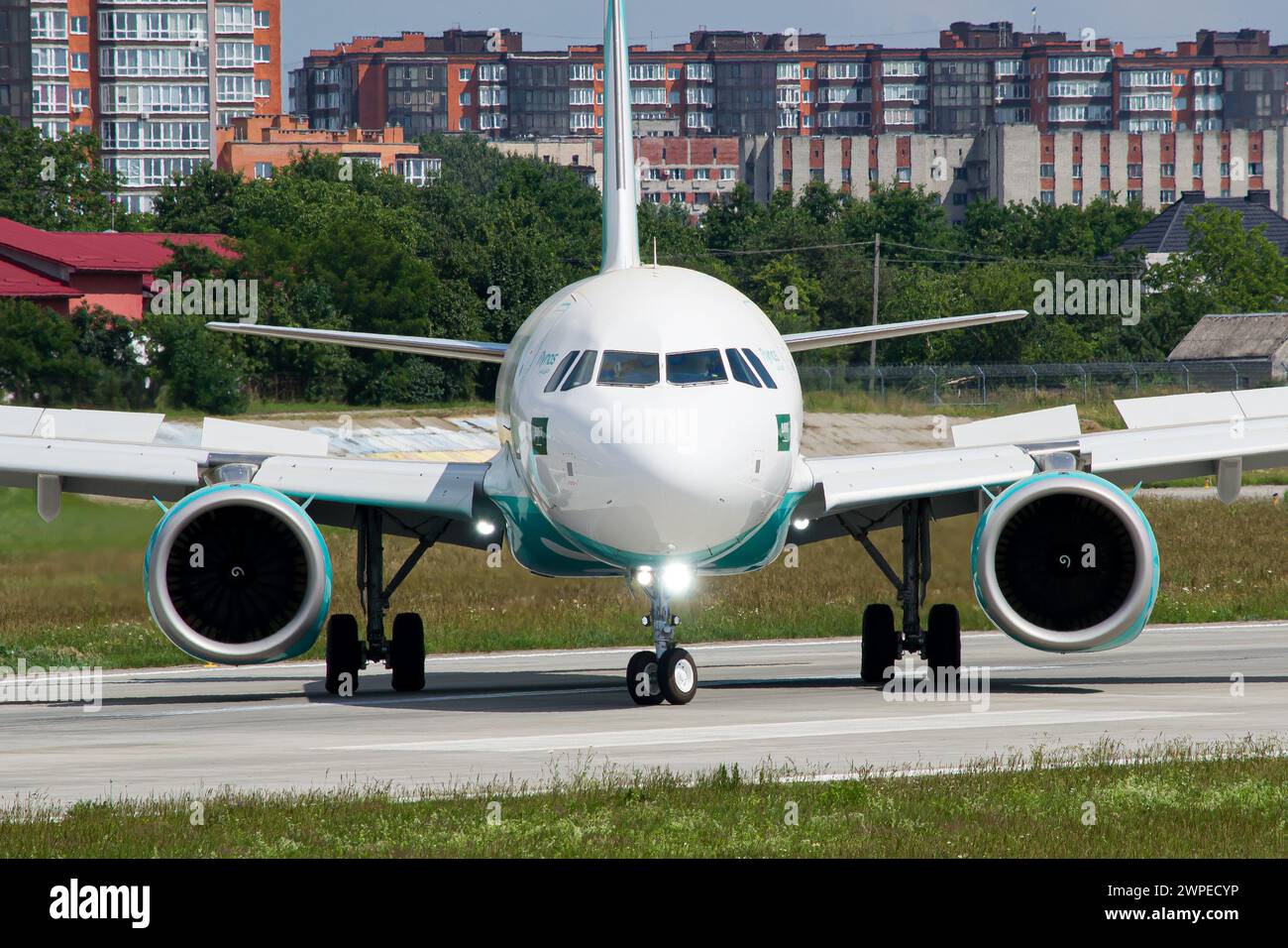 Face-to-face with Saudi airline's Flynas Airbus A320 NEO taxiing after landing at Lviv Stock Photo