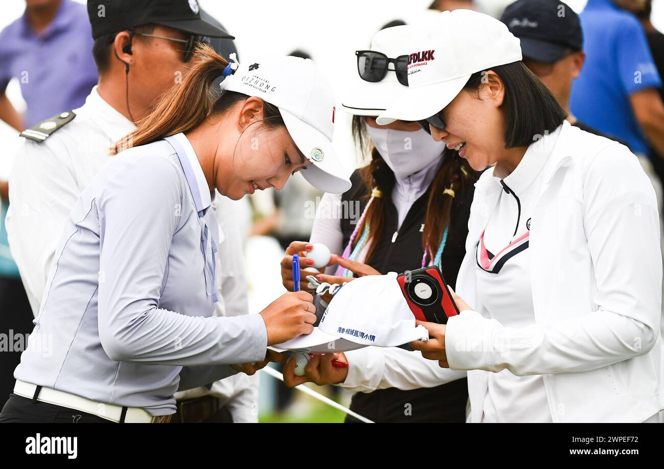 Lingshui, China's Hainan Province. 7th Mar, 2024. Wang Xinying (L) of ...