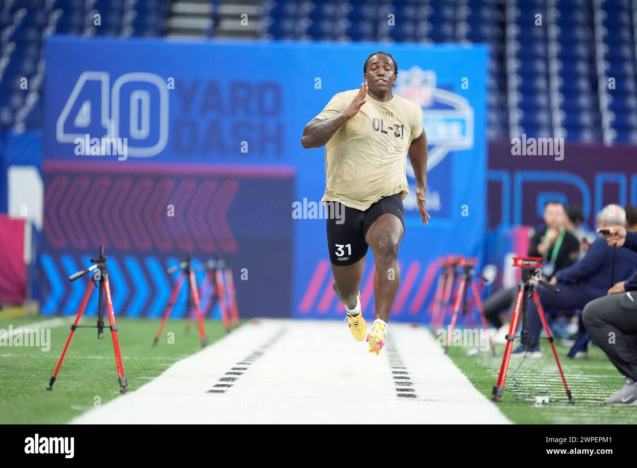 Oklahoma offensive lineman Tyler Guyton runs the 40yard dash at the NFL football scouting