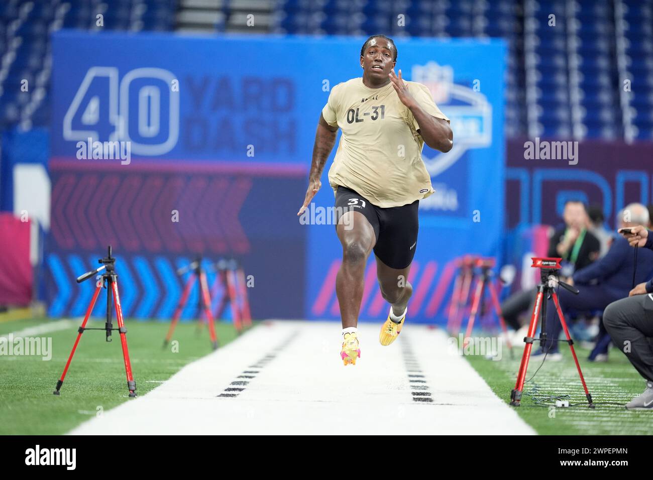 Oklahoma offensive lineman Tyler Guyton runs the 40yard dash at the NFL football scouting