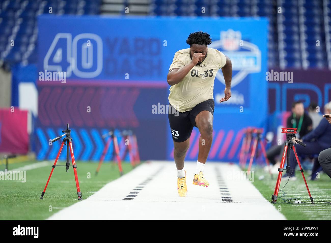 Connecticut offensive lineman Christian Haynes runs the 40yard dash at the NFL football