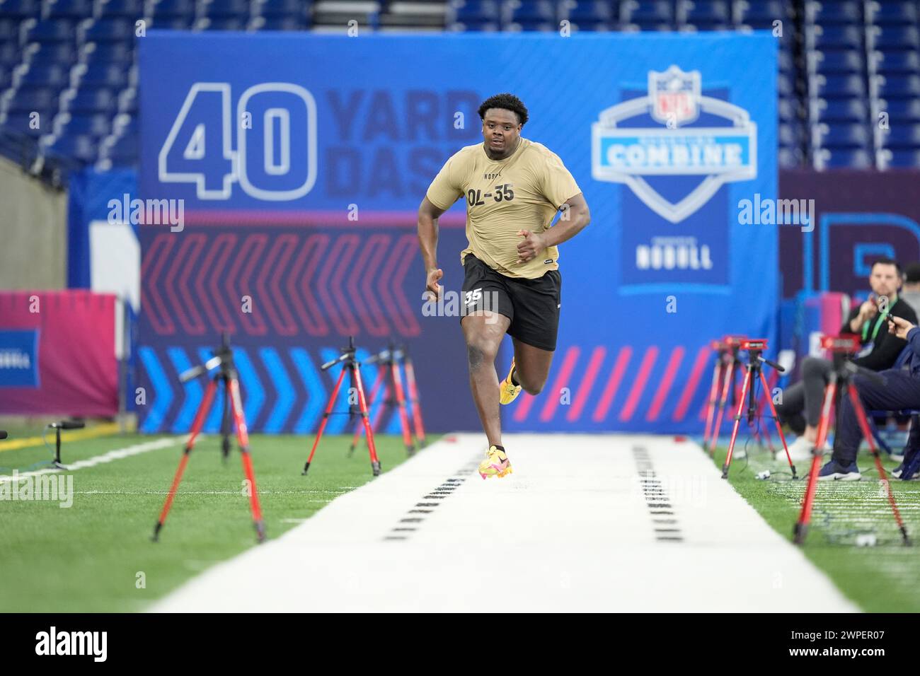 Texas offensive lineman Christian Jones runs the 40yard dash at the NFL football scouting