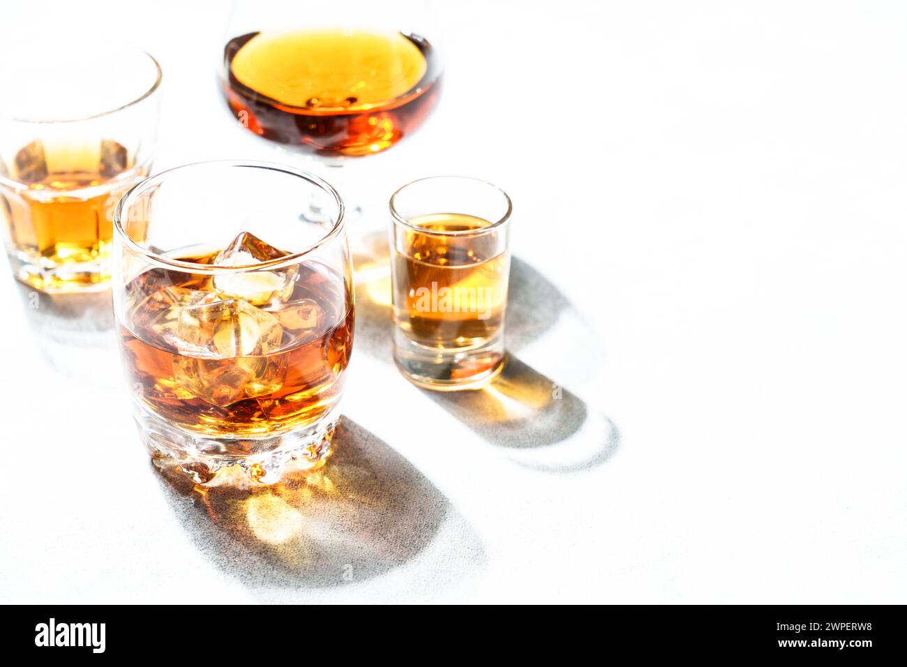 Strong alcohol drink. Whisky, rum, tequila, cognac at white background