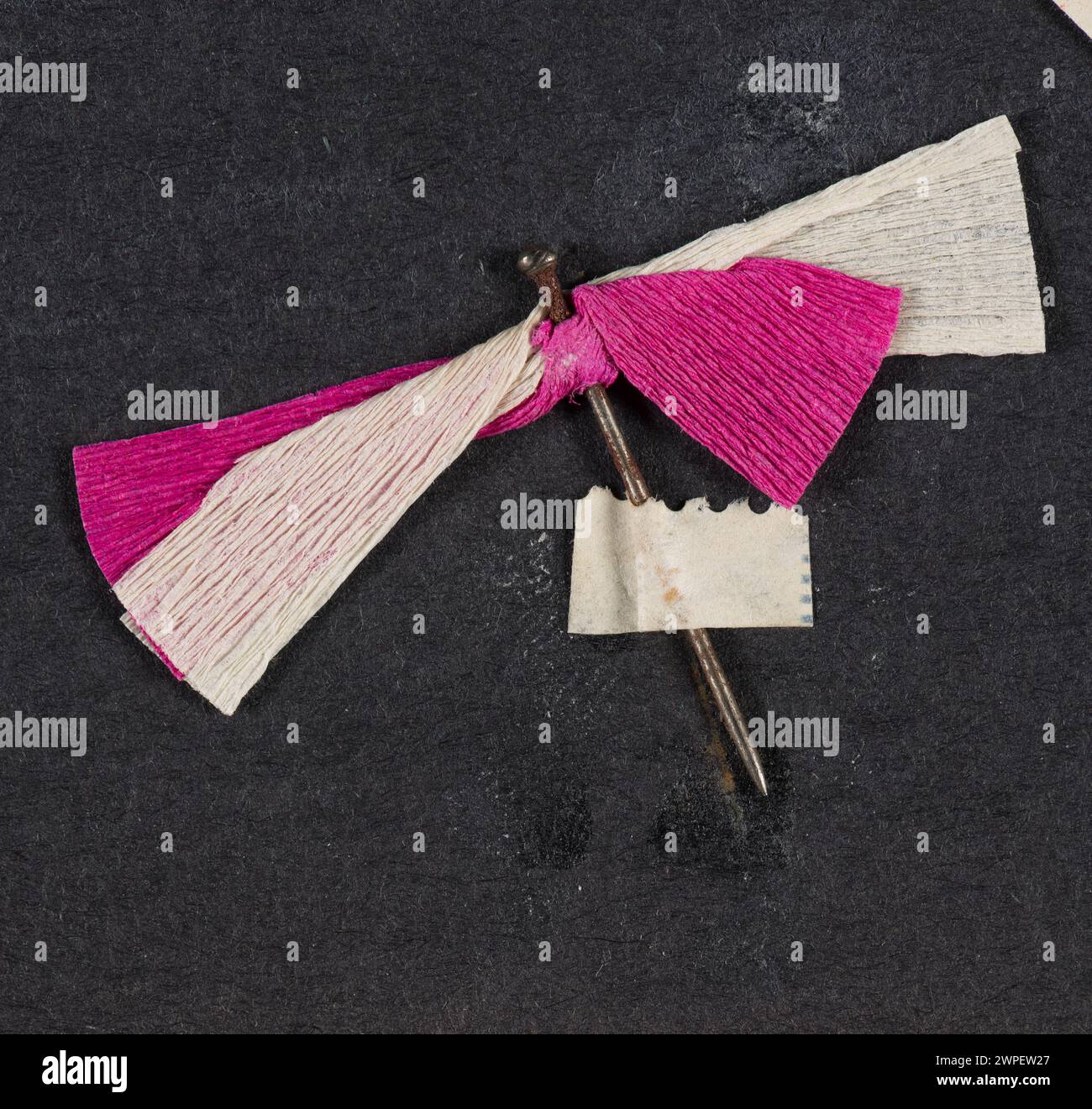 White and red ribbon tied to a pin; around 1915 1920 (1914-00-00-1939 ...