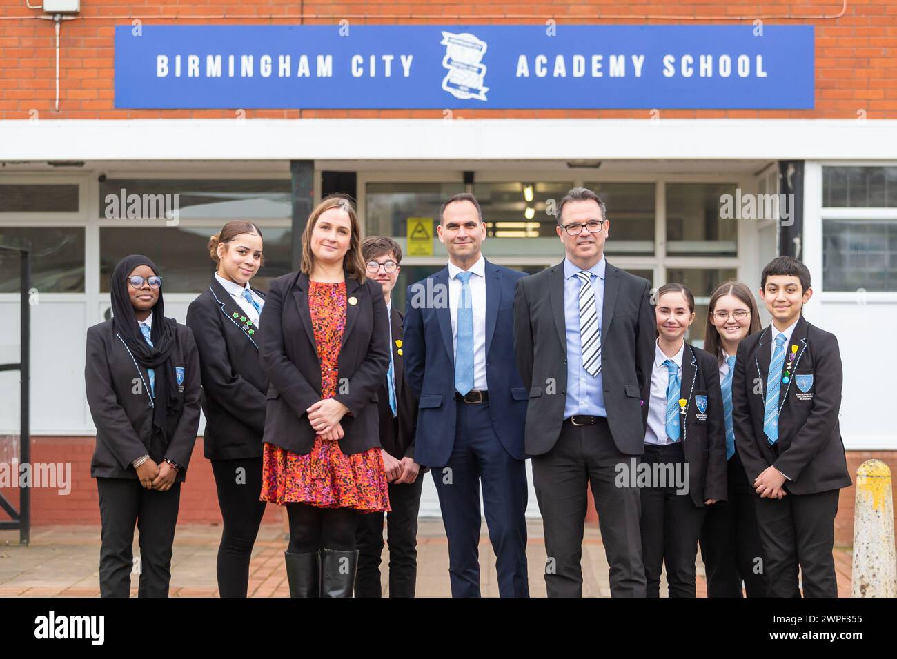 Birmingham, UK. 7th March, 2024. Balhaam Wood Academy in Frankley, Birmingham, UK, celebrates gaining its first 'Good' Ofsted status in 18 years after joining the prestigious King Edward VI Foundation Birmingham in 2019. Headteacher Damian McGarvey, Kind Edwards' CEO and Director of Education Jodh Dhesi and Julie Waddington are pictured with some of its pupils. Birmingham's King Edward VI schools are reknowned nationally for their culture of scholarship underpinned by sensitive pastoral care. Mr McGarvey commented 'Our local community has a strong school that it can be rightly proud of.' Credi Stock Photo