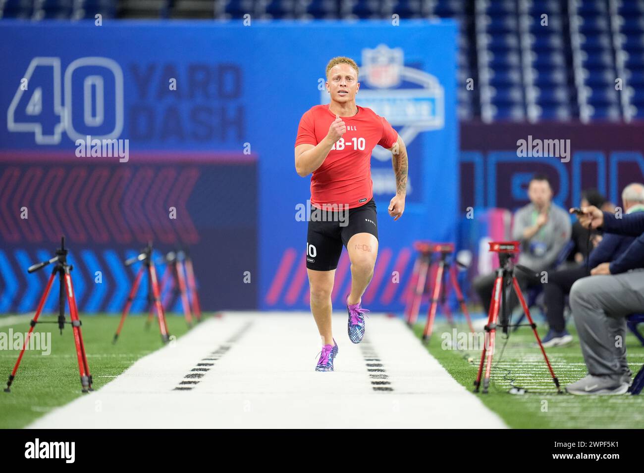 Michael Rattler South Carolina quarterback Spencer Rattler runs a drill at the NFL ...
