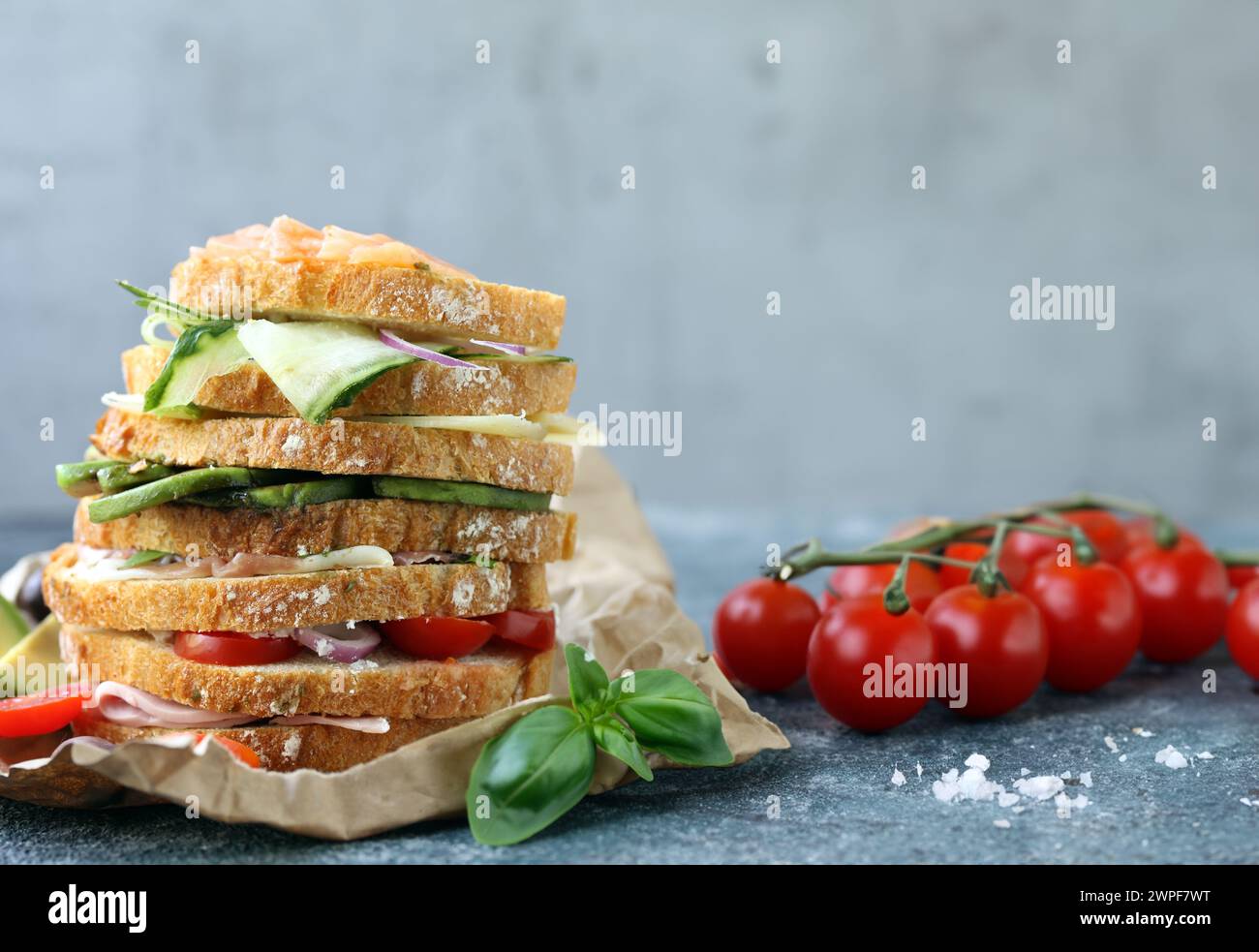 stack of sandwiches with different fillings on the table Stock Photo