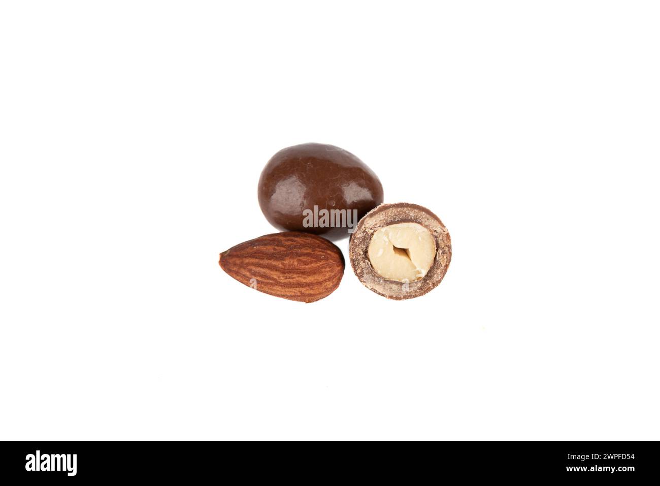 Dark chocolate peanuts isolated on a white background. Copy space. Stock Photo