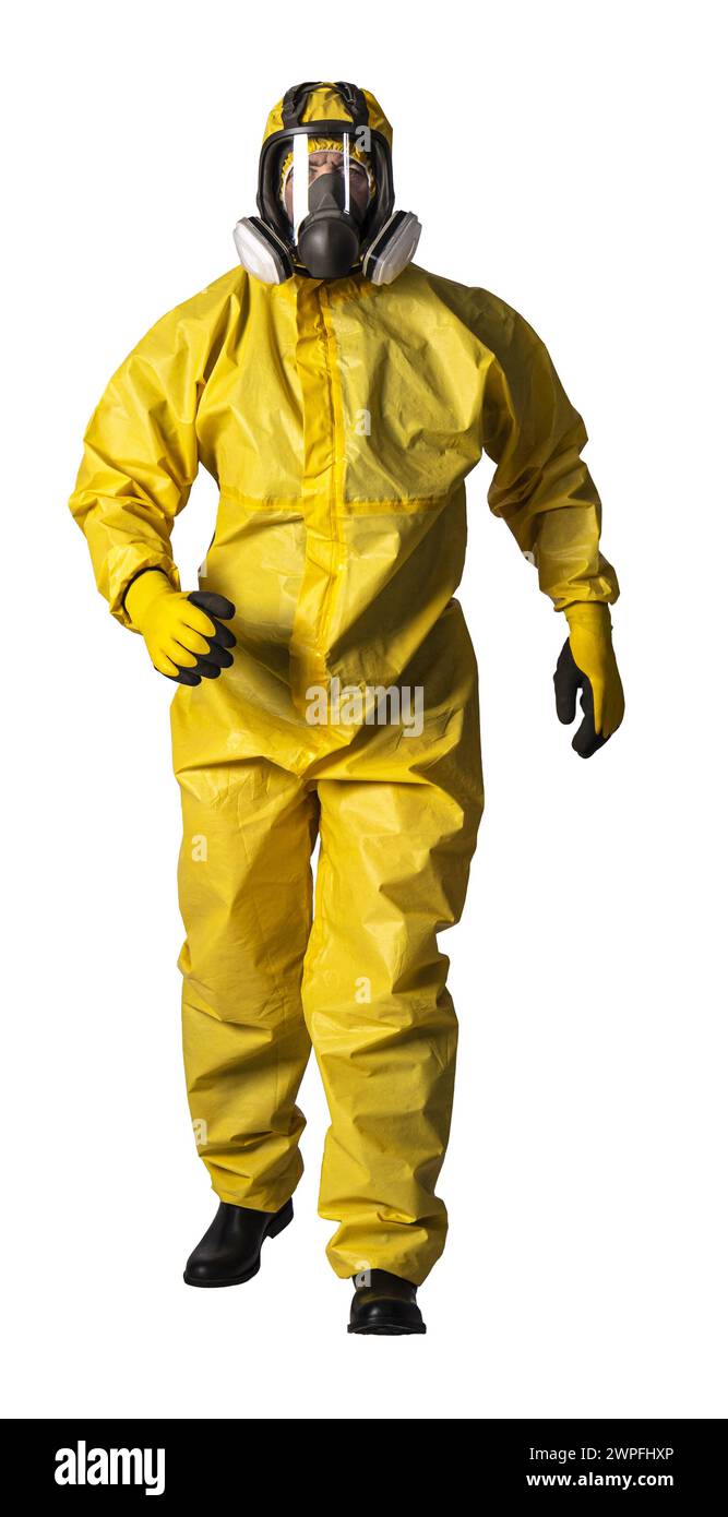 Full body view of a person wearing a protective hazmat suit and a safety respirator against an isolated background Stock Photo