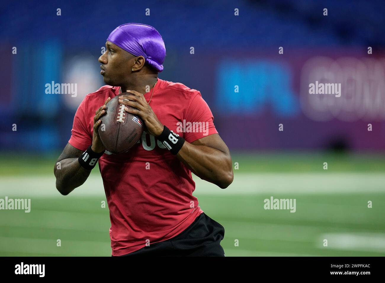 Washington quarterback Michael Penix runs a drill at the NFL football