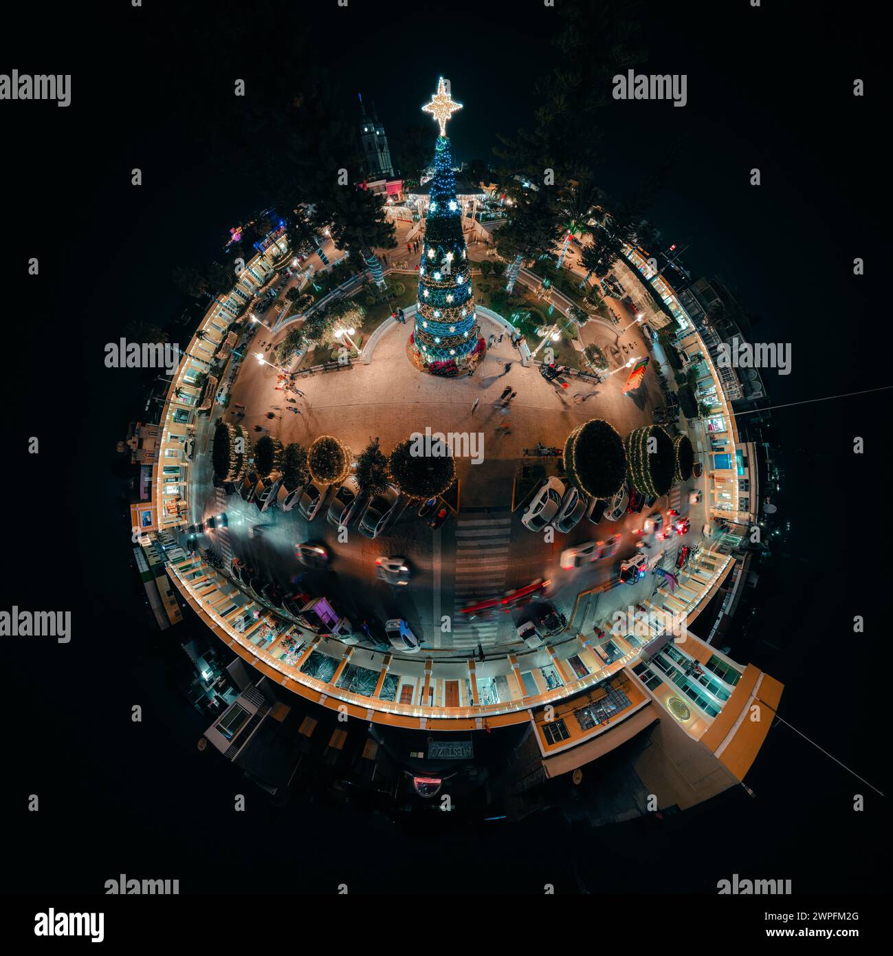 Aerial view of a bustling city street at night: Tuxpan, Jalisco, Mexico ...