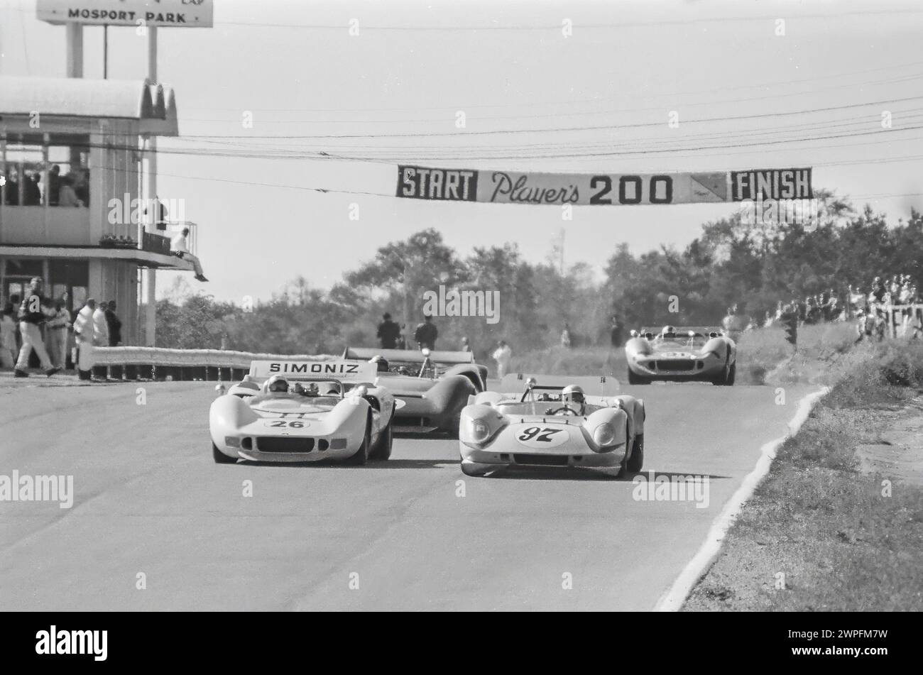 Chuck Parsons and Fred Pipin leading cars down the start finish straight at the 1967 Mosport Park Can Am in Ontario Canada Stock Photo