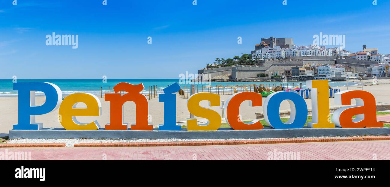 Panorama of colorful letters forming the name of historic town Peniscola, Spain Stock Photo