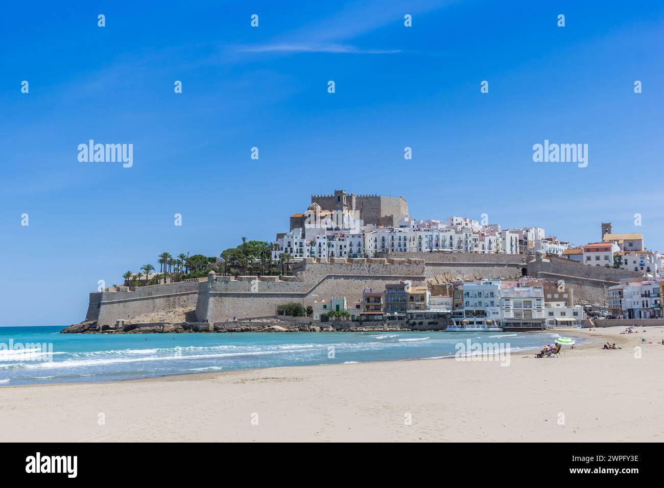 Beach in front of the historic town of Peniscola, Spain Stock Photo