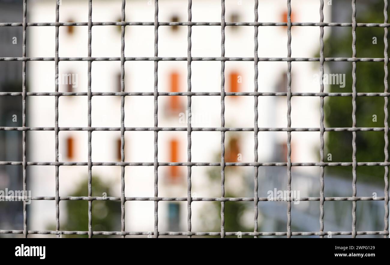 metal fence separating the border and the building intentionally ...