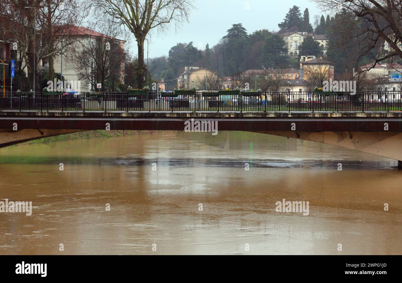 Nearly submerged bridge arch during flooding caused by climate change ...