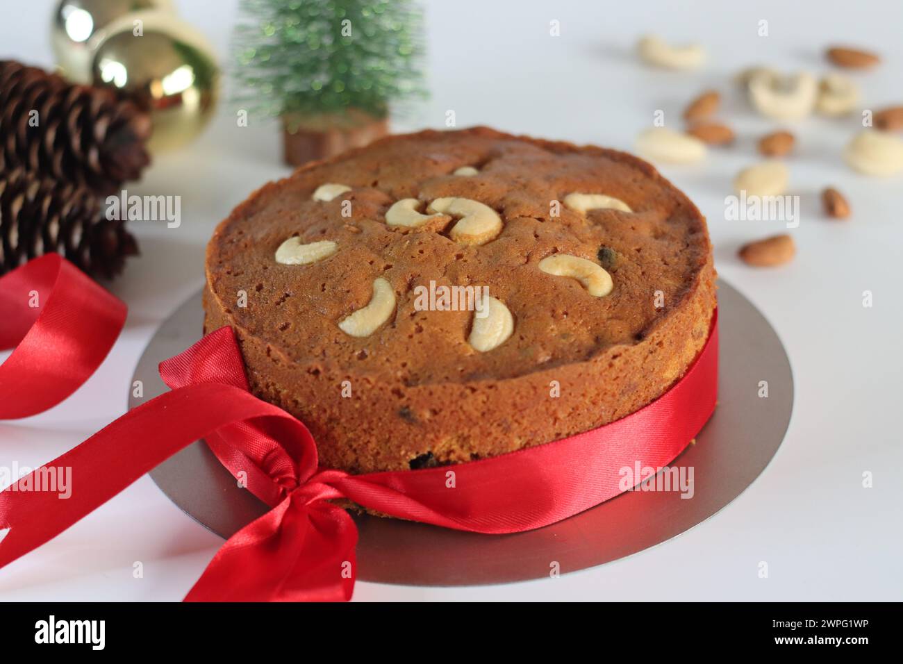 Christmas fruit cake with rum soaked raisins, as festive dessert is ...