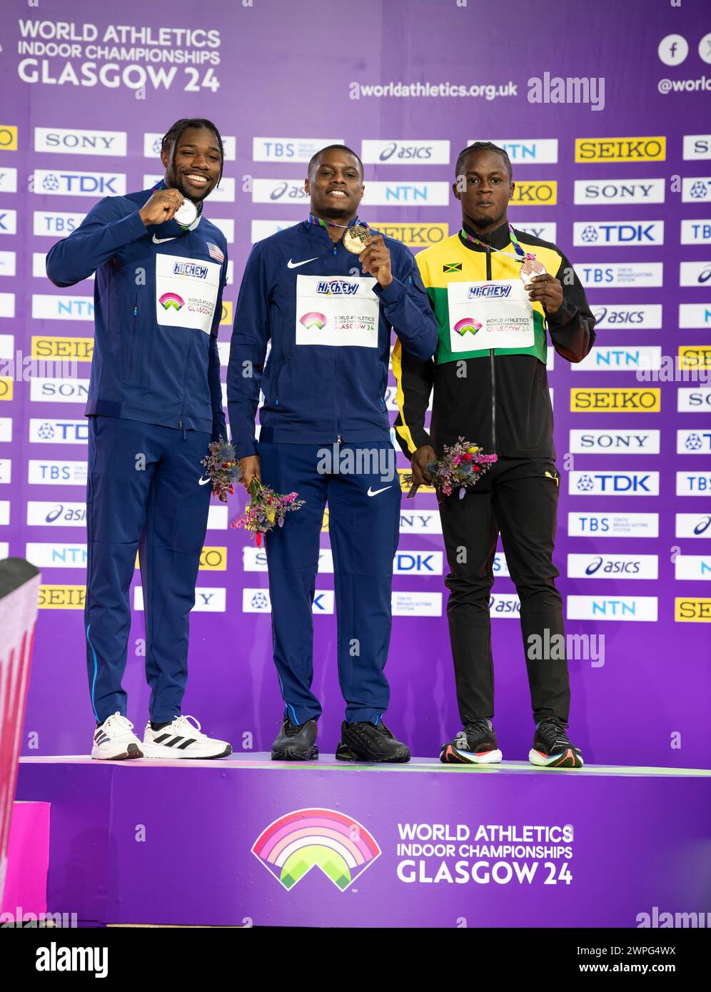 Noah Lyles and Christian Coleman of the USA and Ackeem Blake of Jamaica