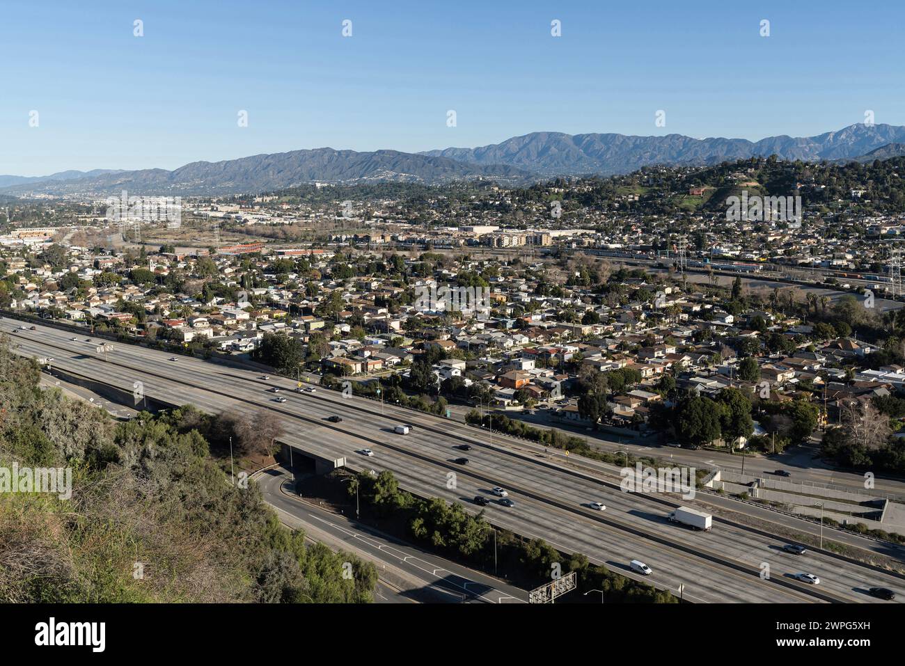 Hilltop view of the Golden State 5 freeway passing through the Elysian Valley and Cypress Park neighborhoods of Los Angeles, California. Stock Photo