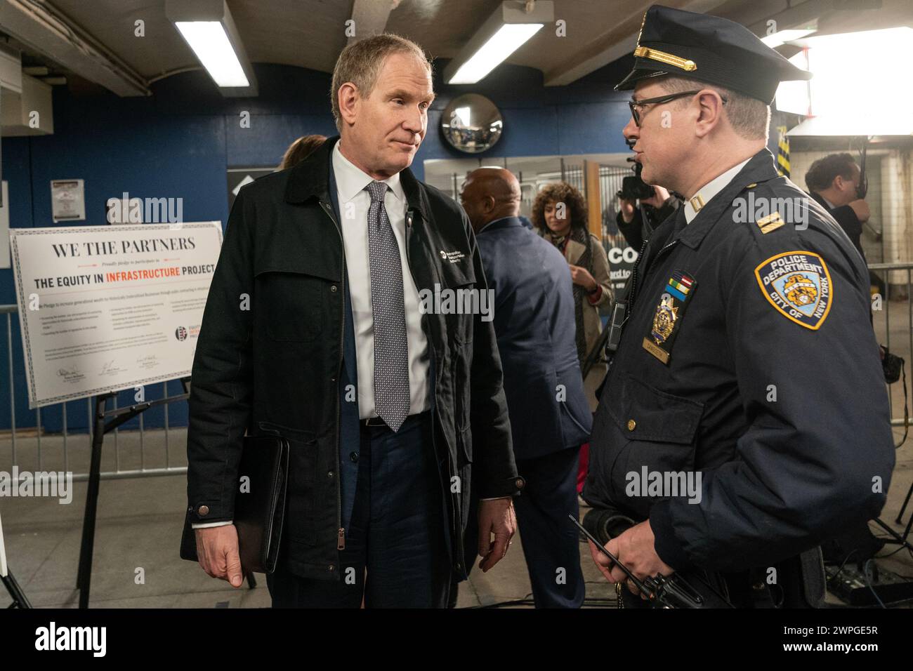 Janno Lieber and NYPD captain Eric Sandseth attend MTA announcement at 14th street subway station in New York on March 7, 2024 Stock Photo