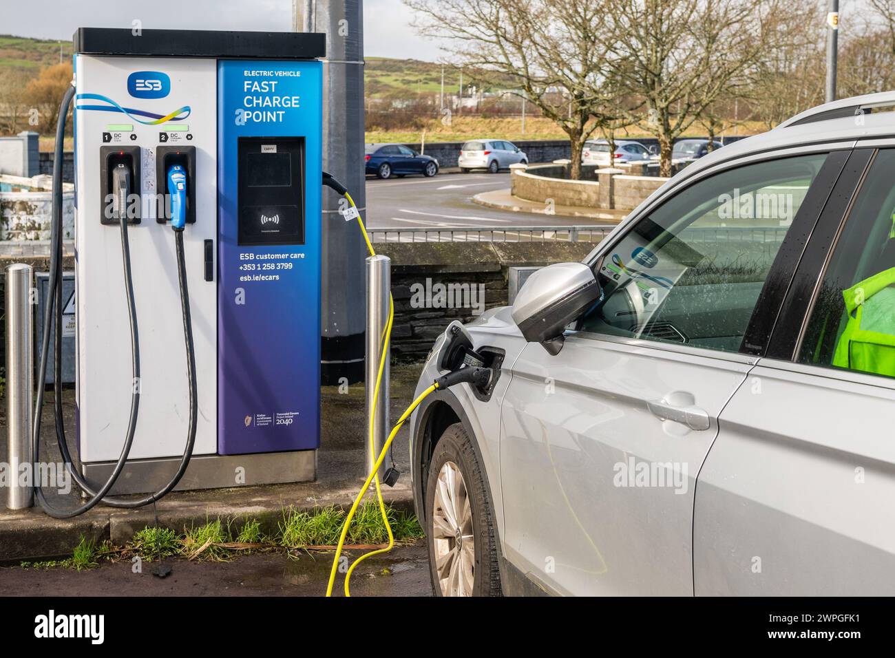 Electric car charging in Skibbereen, West Cork, Ireland. Stock Photo