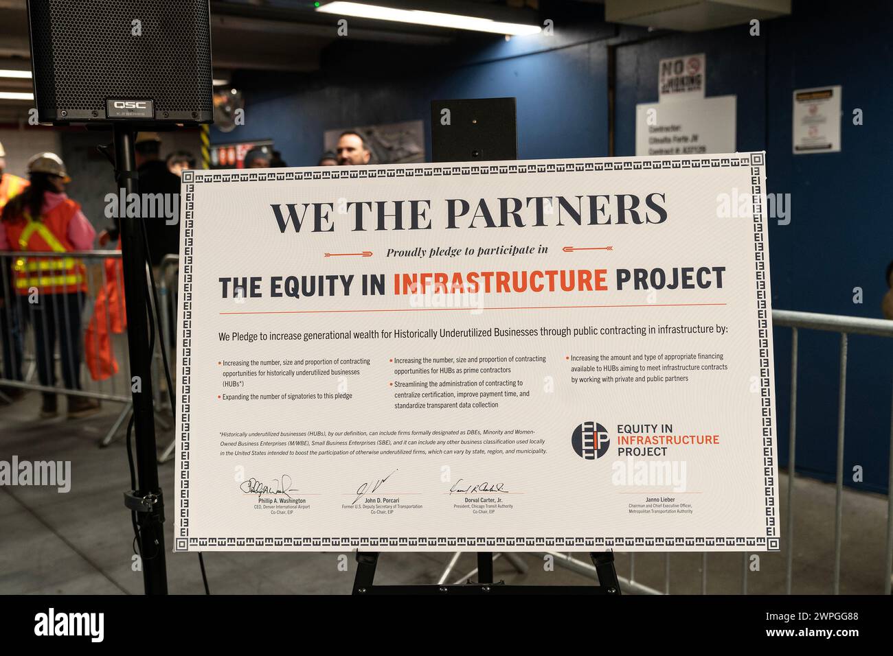 Poster describing project seen during MTA announcement at 14th street subway station in New York on March 7, 2024. Dorval Carter Jr., Chicago Transit Authority President and Equity in Infrastructure Project Co-Chair, John Porcari, Equity in Infrastructure Project Co-Founder and Former U.S. Deputy Secretary of Transportation, Phillip Washington, Denver International Airport CEO and Equity in Infrastructure Project Chair, Janno Lieber, MTA Chair and CEO signed a pledge to promote minorities and women owned business to receive contracts to work on infrastructure projects for public transportation Stock Photo