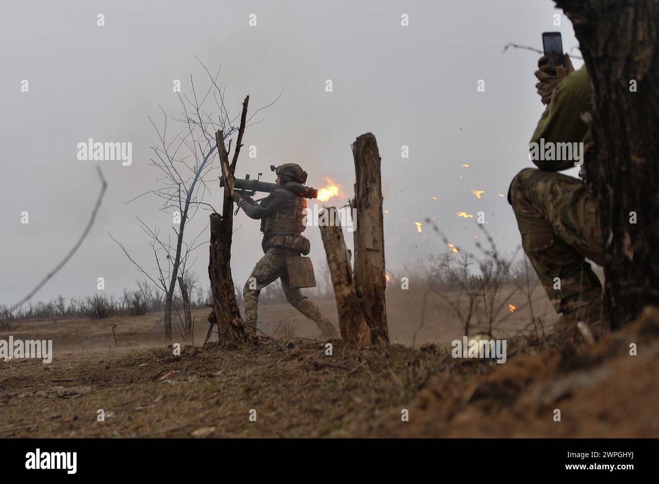 Kyiv, Donetsk Oblast, Ukraine. 7th Mar, 2024. Zhenya, a Ukrainian soldier, fires a hornet system at Russian lines a few hundred meters away. Russian infantry positions are 100m away from Ukrainian lines. (Credit Image: © Madeleine Kelly/ZUMA Press Wire) EDITORIAL USAGE ONLY! Not for Commercial USAGE! Stock Photo