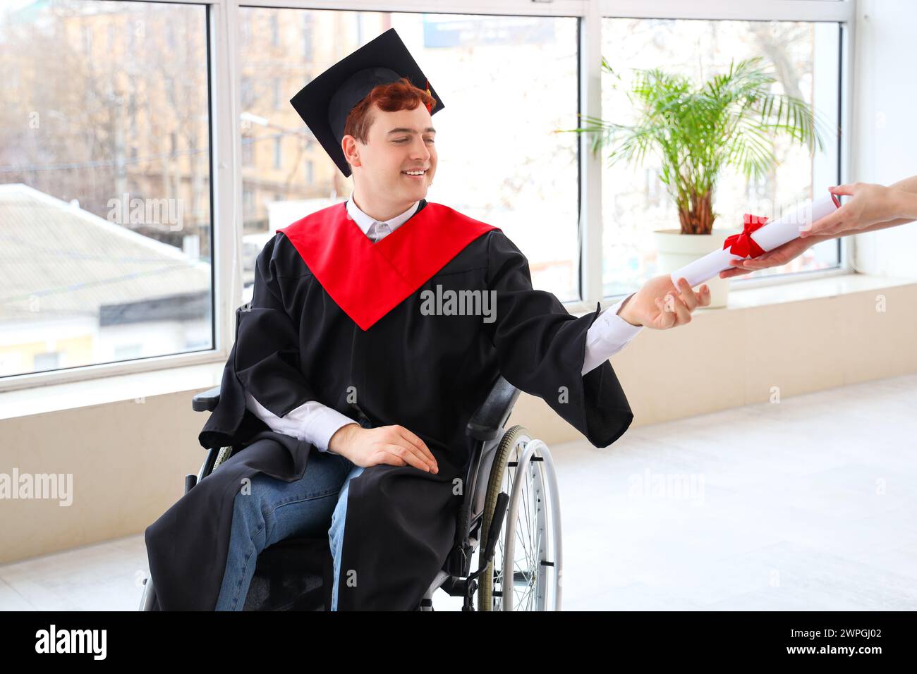 Wheelchair student graduating hi-res stock photography and images - Alamy