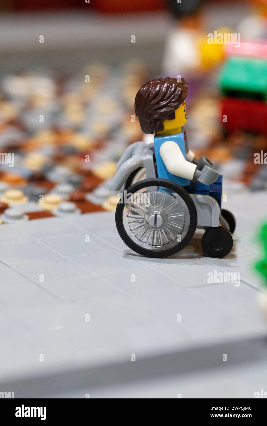Lego Figure in a Wheelchair Stock Photo