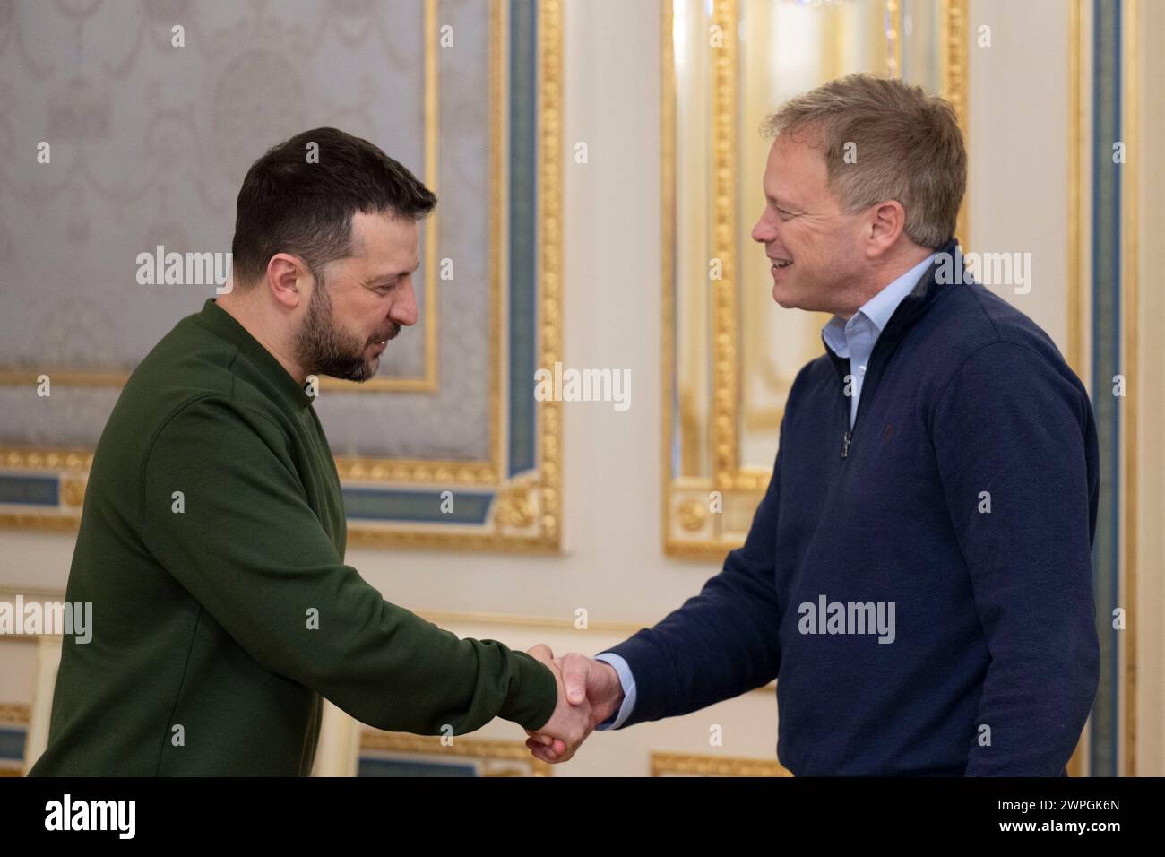 In this photo provided by the Ukrainian Presidential Press Office, Ukrainian President Volodymyr Zelenskyy, left, shakes hands with British Defense Secretary Grant Shapps in Kyiv, Ukraine, Thursday, March 7, 2024. (Ukrainian Presidential Press Office via AP) Stock Photo