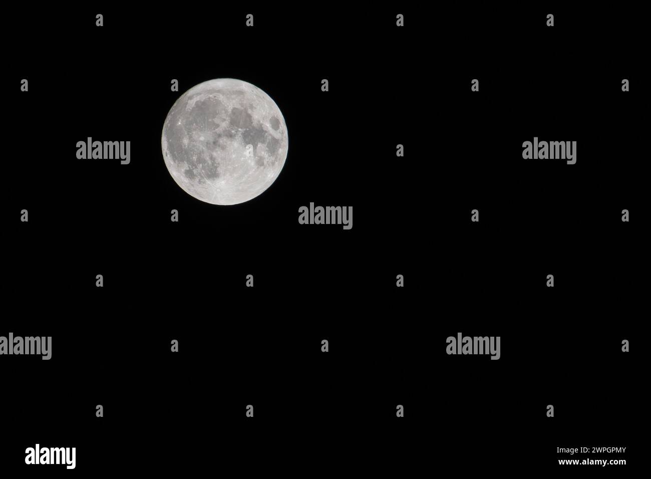 Full moon against a black sky Stock Photo