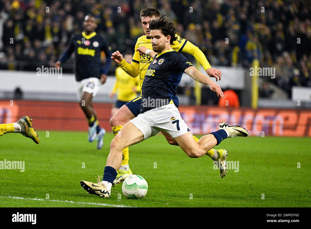 Brussels, Belgium. 07th Mar, 2024. Union's Alessio Castro-Montes and Fenerbahce's Ferdi Kadioglu fight for the ball during a soccer game between Belgian club Royale Union Saint Gilloise and Turkish club Fenerbahce, on Thursday 07 March 2024 in Brussels, the first leg of the 1/8 finals of the UEFA Conference League competition. BELGA PHOTO LAURIE DIEFFEMBACQ Credit: Belga News Agency/Alamy Live News Stock Photo