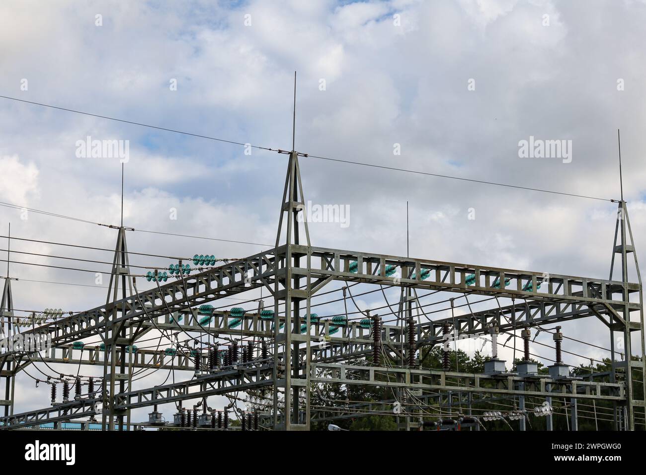 Power station and cables, blue sky and clouds background Stock Photo ...