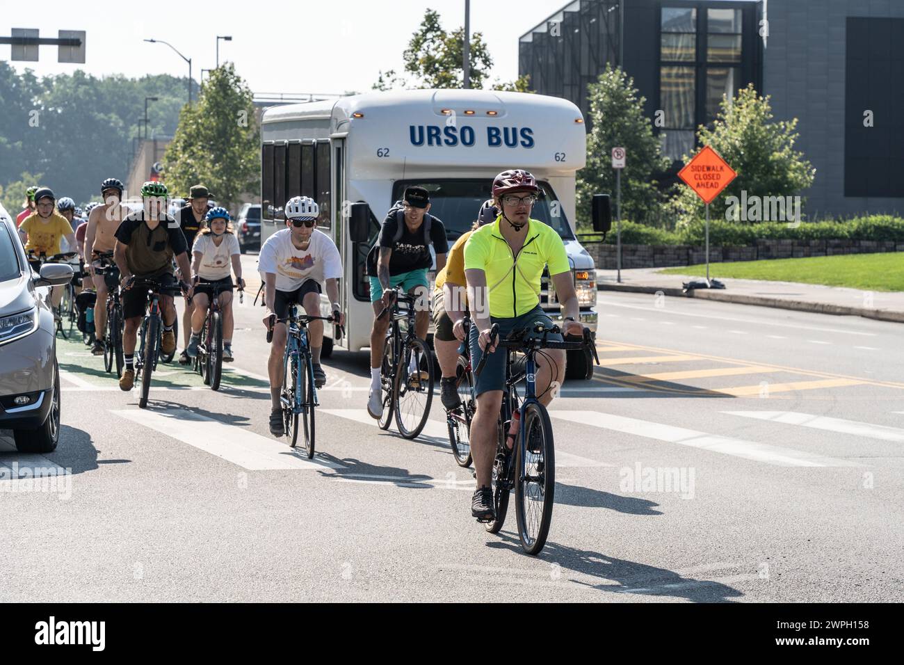 Pittsburgh, Pennsylvania – July 23,2023: Group of cyclists on Forbes Avenue in Pittsburgh, Pennsylvania Stock Photo