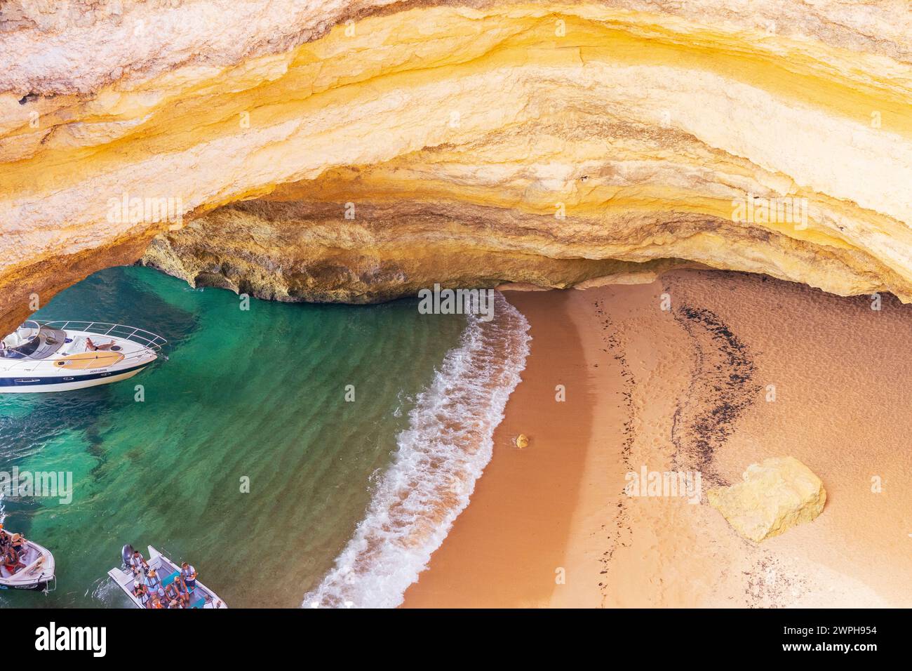 Algarve, Portugal - 14.09.2023: Benagil cave in Algarve with boats. Top down view. Lagoa, Carvoeiro, Algarve, Portugal Stock Photo