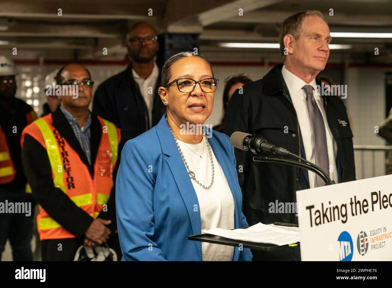 Lourdes Zapata, MTA Chief Diversity & Inclusion Officer speaks during MTA announcement at 14th street subway station in New York. Dorval Carter Jr., Chicago Transit Authority President and Equity in Infrastructure Project Co-Chair, John Porcari, Equity in Infrastructure Project Co-Founder and Former U.S. Deputy Secretary of Transportation, Phillip Washington, Denver International Airport CEO and Equity in Infrastructure Project Chair, Janno Lieber, MTA Chair and CEO signed a pledge to promote minorities and women owned business to receive contracts to work on infrastructure projects for public Stock Photo