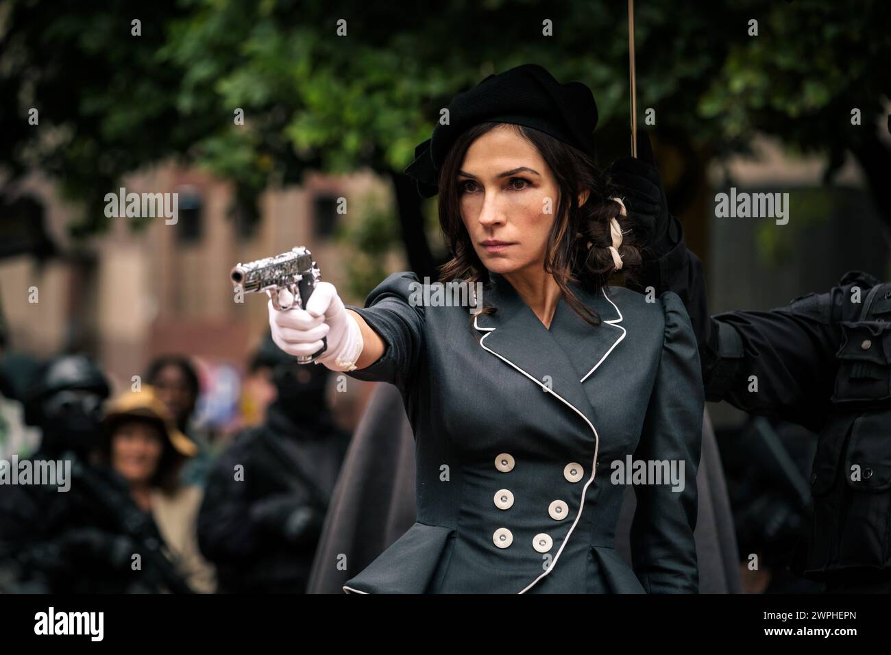 RELEASE DATE: April 26, 2024. TITLE: Boy Kills World. STUDIO: Lionsgate. DIRECTOR: Moritz Mohr. PLOT: A dystopian fever dream action film that follows Boy, a deaf person with a vibrant imagination. When his family is murdered, he is trained by a mysterious shaman to repress his childish imagination and become an instrument of death. STARRING: FAMKE JANSSEN as Hilda Van Der Koy. (Credit Image: © Lionsgate/Entertainment Pictures/ZUMAPRESS.com) EDITORIAL USAGE ONLY! Not for Commercial USAGE! Stock Photo