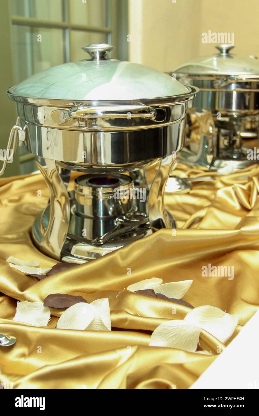 Row of chafing Dishes shot vertically Stock Photo