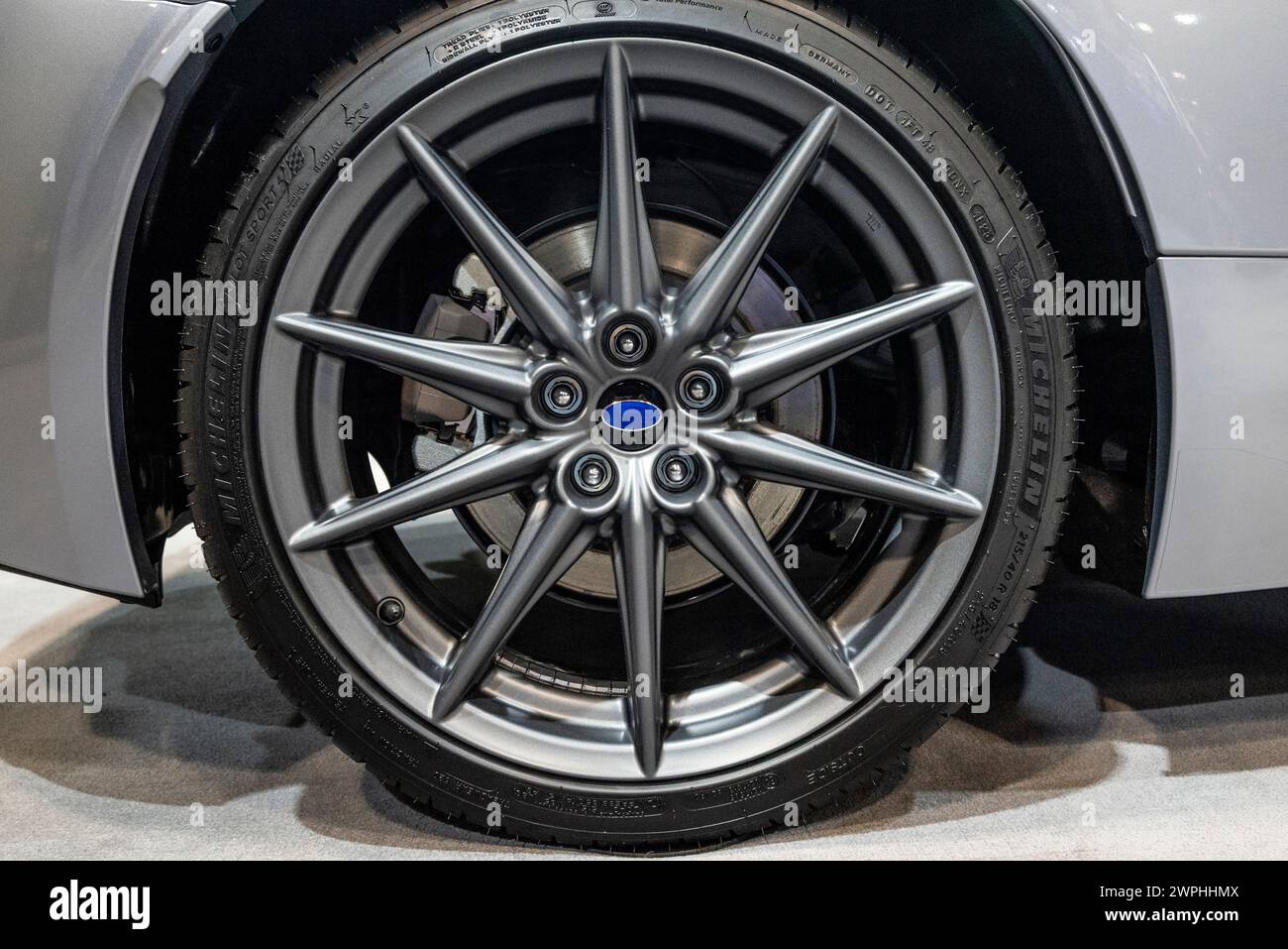 An alloy car wheel, engineered for both style and performance, combines lightweight construction with durability, enhancing vehicle handling and aesth Stock Photo
