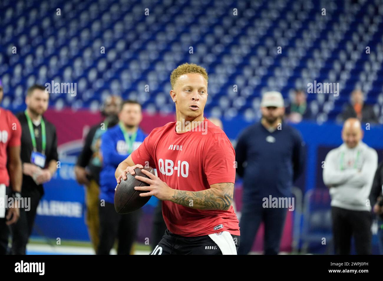 Michael Rattler South Carolina quarterback Spencer Rattler runs a drill at the NFL ...