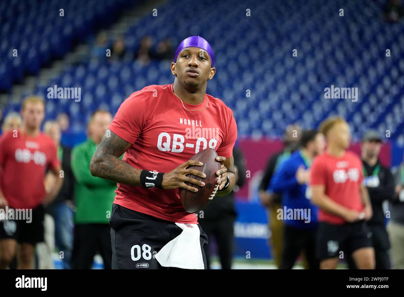 Washington quarterback Michael Penix runs a drill at the NFL football