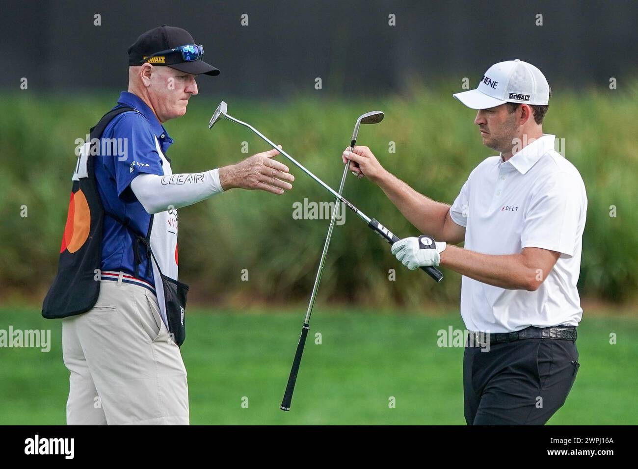March 7, 2024, Orlando, Florida, United States Patrick Cantlay (R) and his caddie Joe LaCava